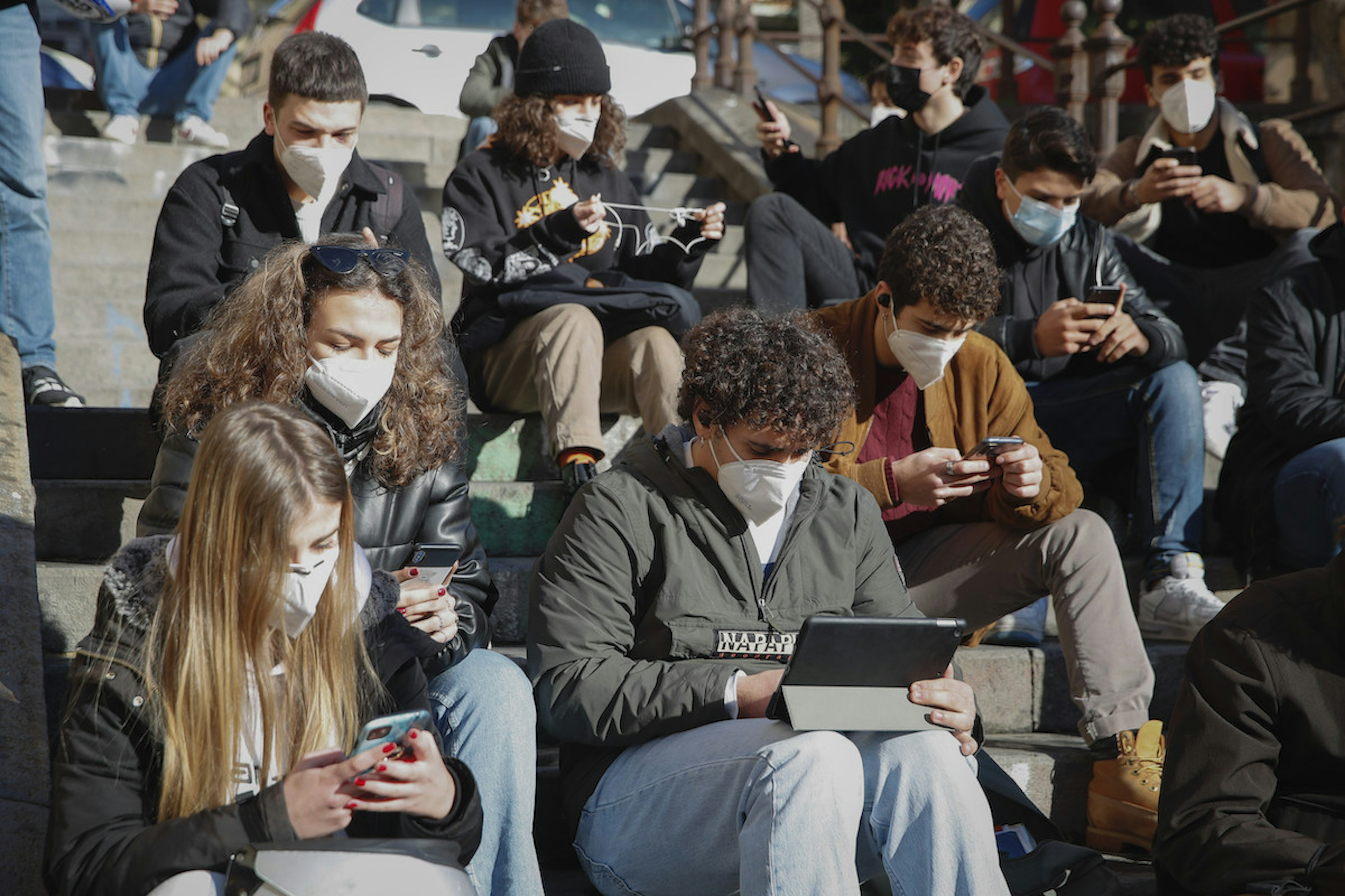Some high school students who cannot enter the classroom,