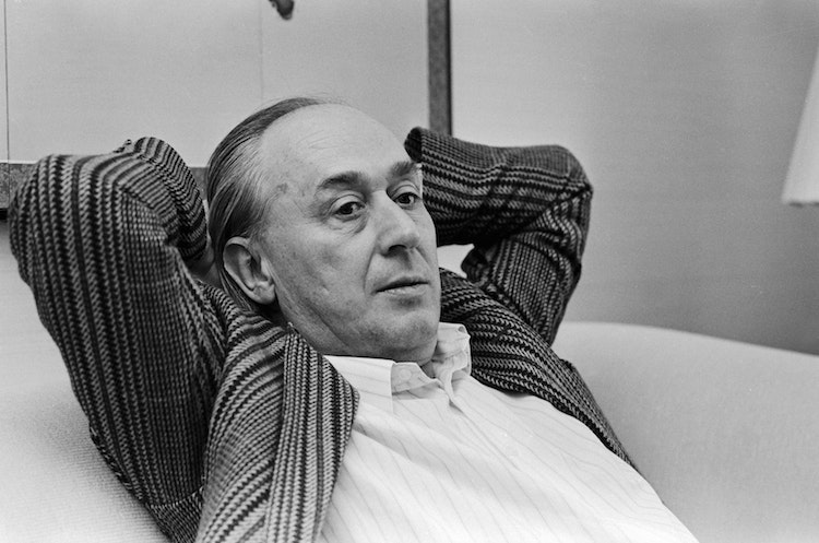J.G. Ballard with Arms Behind Head