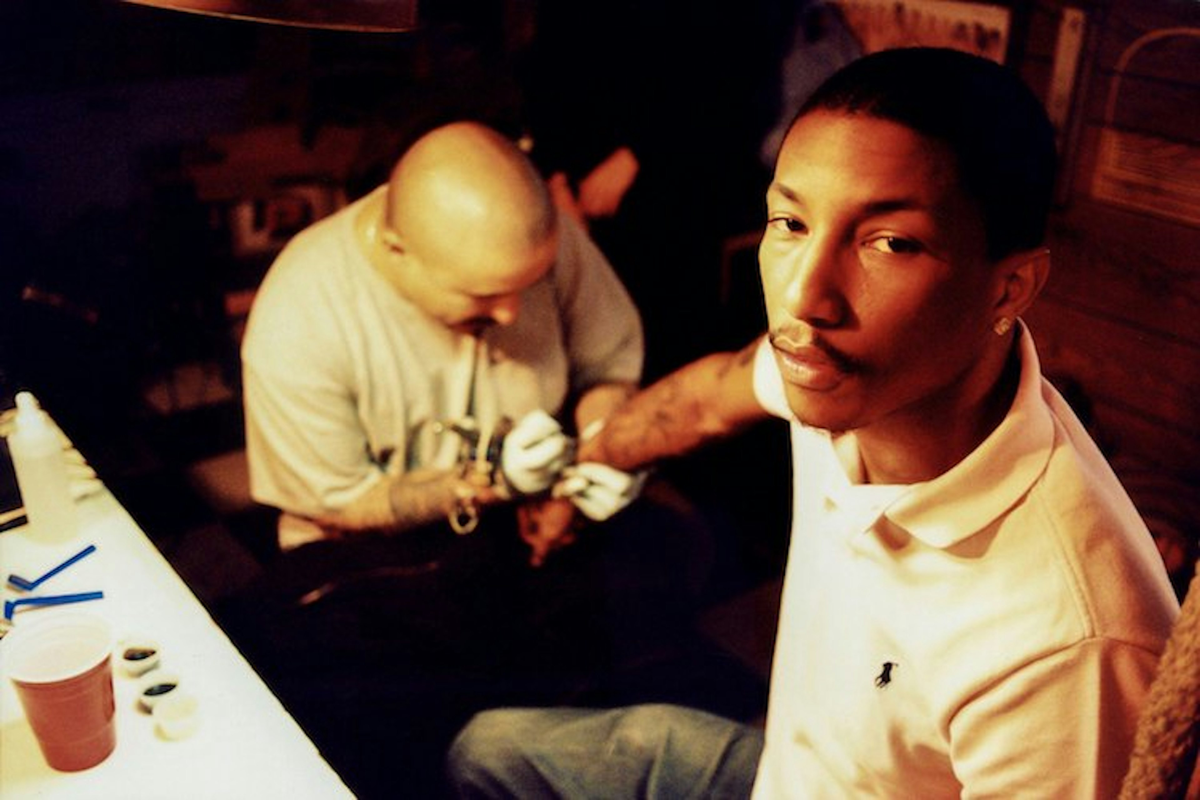 Pharrell Tattoo Book