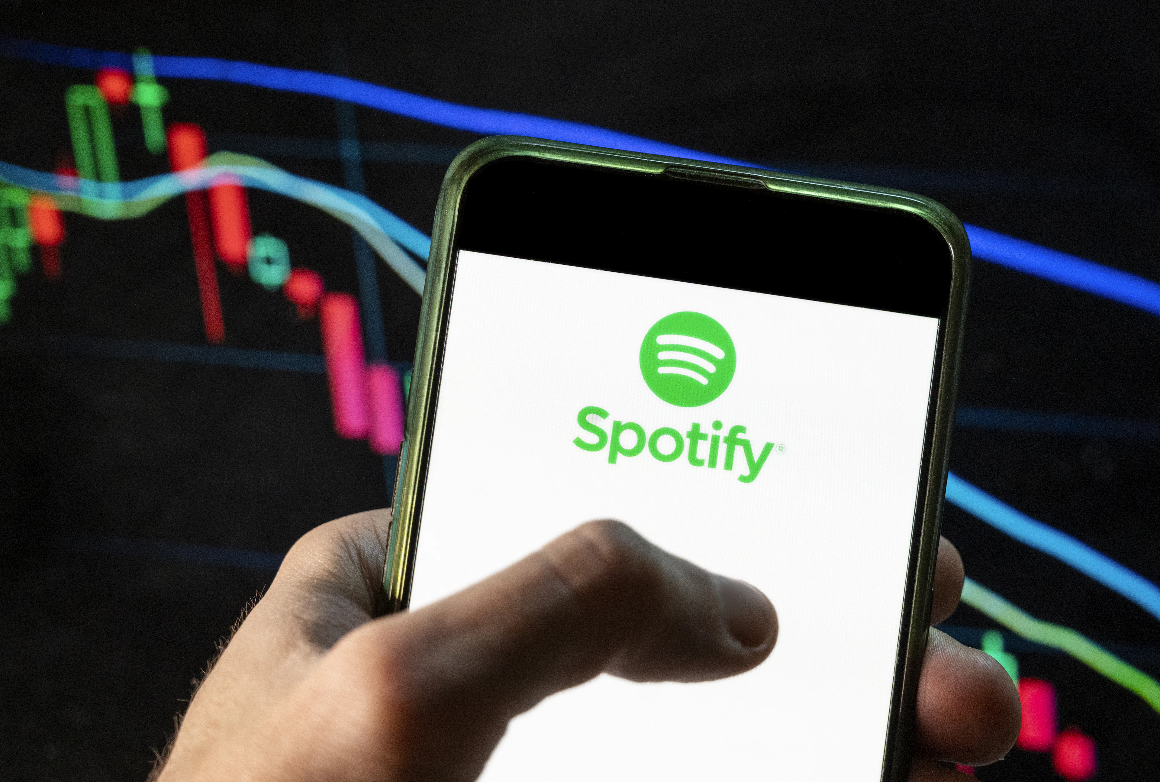 In this photo illustration, the logo of Spotify, a Swedish